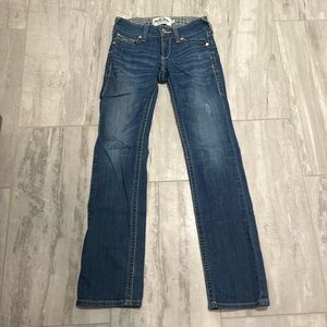 These are ariat jeans size 25 r a few small rips but still look great